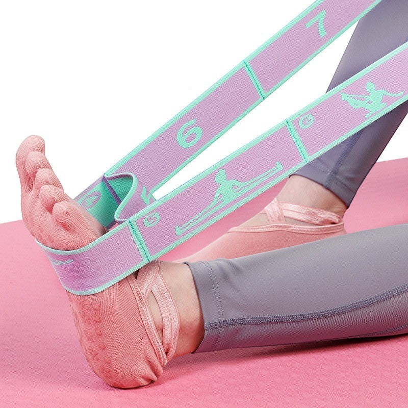 Improve movement and flexibility with a durable yoga stretch band featuring multiple loops for versatile exercise options.